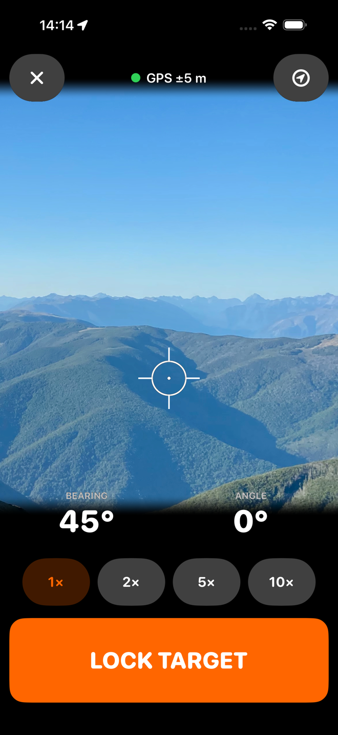 The sight screen: a bush-covered face across a valley seen through the camera, a centred reticle on it, GPS plus or minus 5 metres, a bearing of 45 degrees and an angle of 0 degrees, with zoom buttons and a LOCK TARGET button.